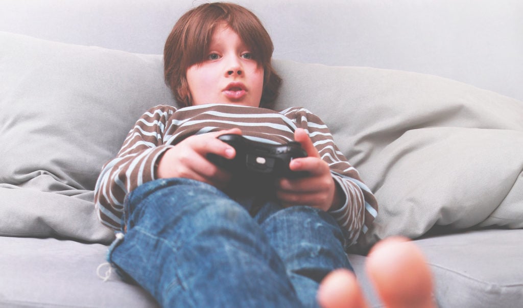 child playing video games while Stay Home Alone
