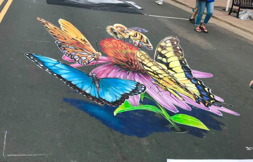 chalk drawing of a butterfly and bee 