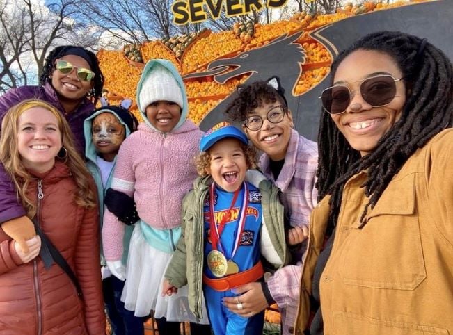 family having fun at sever's fall festival in jordan Minnesota