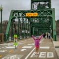girl crossing Stillwater lift bridge in Minnesota