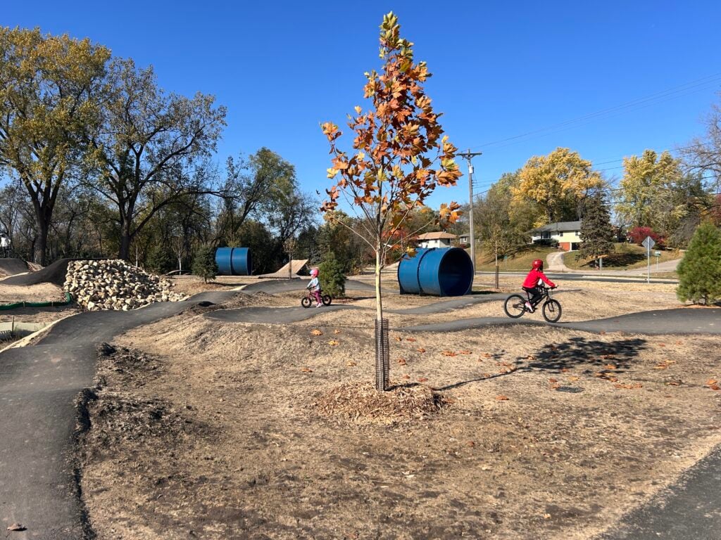 kid riding bike at tretbaugh bike park in Bloomington Minnesota
