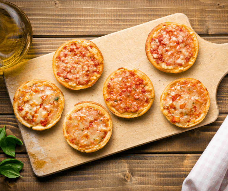 6 mini pizza on cutting board