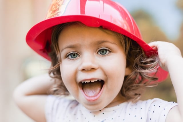 Kid with a fire hat
